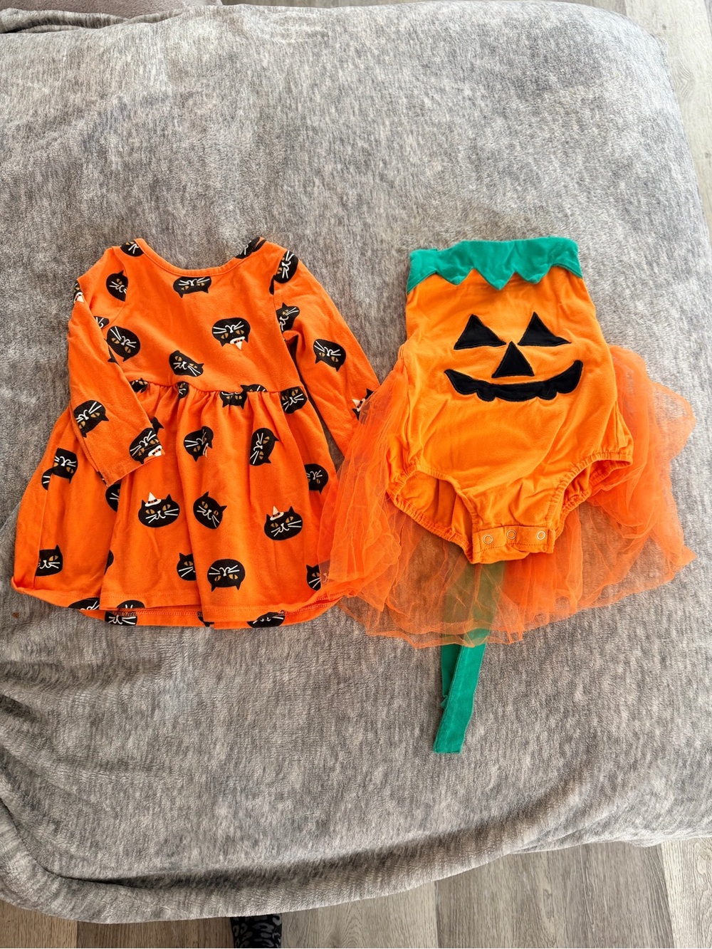 Set of two Halloween outfits. Pumpkin jack o lantern onesie and cat dress.